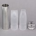 A close-up of the iSi 3 Piece Decorator Tips and Adapter set. It includes a metal tube and plastic tubes.