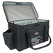 A black and grey Sterno Delivery Deluxe insulated food carrier with a zipper and black handle.
