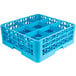 A blue plastic Carlisle glass rack with nine compartments and two extenders.