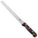 A long Victorinox slicing / carving knife with a wooden handle.