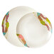 A white GET Contemporary Melamine plate with colorful designs.