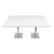 An Art Marble Furniture Carrera White Quartz table top on white table with silver legs.