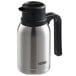 A silver and black Thermos stainless steel vacuum insulated carafe with twist top.