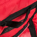 A red Rubbermaid insulated delivery bag with a zipper on the side.