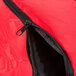 A red Rubbermaid insulated pizza delivery bag with a black zipper.