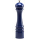 A Chef Specialties cobalt blue pepper mill with a silver handle.