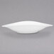 A white Villeroy & Boch porcelain oval plate with a curved edge on a grey background.