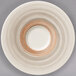 A white porcelain saucer with a taupe rim.