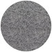 A close-up of a grey Art Marble Furniture round quartz tabletop with small black specks.