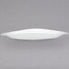 A white Villeroy & Boch porcelain oval plate with a curved edge.