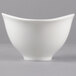 A white Villeroy & Boch Dune porcelain bowl with a curved edge.