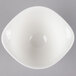 A white Villeroy & Boch porcelain bowl with a small hole in the middle.