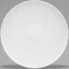 A white Villeroy & Boch Bone Porcelain flat coupe plate with a white rim.