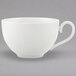 A close-up of a white Villeroy & Boch bone porcelain cup with a handle.