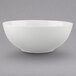 A Villeroy & Boch white bone porcelain bowl on a gray surface.