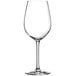 A close-up of a clear Chef & Sommelier Sequence wine glass with a stem.