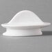 A white porcelain Villeroy & Boch teapot lid with a rounded top.
