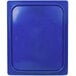 A blue rectangular plastic lid with holes on a white background.