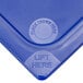 A blue Carlisle Smart Lid for 1/2 size soft food pans with a blue plastic surface and the words "lift here" in a blue circle.
