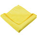 A yellow Unger SmartColor microfiber cleaning cloth folded on a white background.