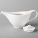 A white Villeroy & Boch porcelain teapot with a lid.
