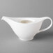 A white Villeroy & Boch porcelain teapot with a handle.