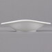 A Villeroy & Boch white porcelain flat bowl with a curved edge.