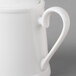 A Villeroy & Boch white bone porcelain sugar bowl with a cover on a white background.