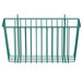 A green metal wire basket for dishes on a white background.