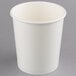 A white paper cup with a lid on a gray background.