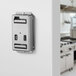 A silver Edlund Titan Max-Cut Slicer wall mount outlet.