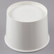 A white paper container with a white lid.