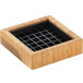 A wooden square box with a grid in it.