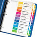 A file folder with Avery Ready Index multi-color divider tabs in it.