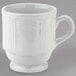A Tuxton bright white china mug with a handle.