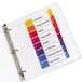 A white binder with Avery multi-color table of contents divider tabs.