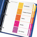 A binder with colorful Avery table of contents dividers.