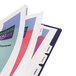 A pack of several Avery file folders with white tabs and colorful papers.