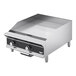 A silver and black Vollrath countertop griddle with manual controls.