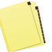 A yellow file folder with brown tabs and a brown square with gold text that says "Avery 11328 Pre-Printed Red Leather 12-Tab Dividers"