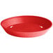 A red plastic round platter with a white background.