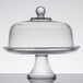 An Anchor Hocking glass cake stand with a glass cover.