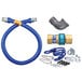 A blue Dormont gas connector hose kit with metal fittings and a restraining cable.