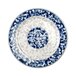 A close-up of a blue and white Thunder Group Blue Dragon melamine plate with a circular design.