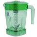 A green Waring blender jar with a handle and lid.
