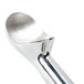 A close-up of a silver Zeroll ice cream scoop.