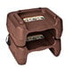 Two brown plastic Koala Kare booster seats with black safety straps on a table.
