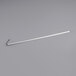 A white metal rod with a long white ruler on a gray background.