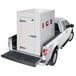 A white truck with a Leer 4X8CP refrigerated wall in the back.