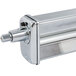 A close-up of a stainless steel KitchenAid pasta roller cylinder with a handle on it.